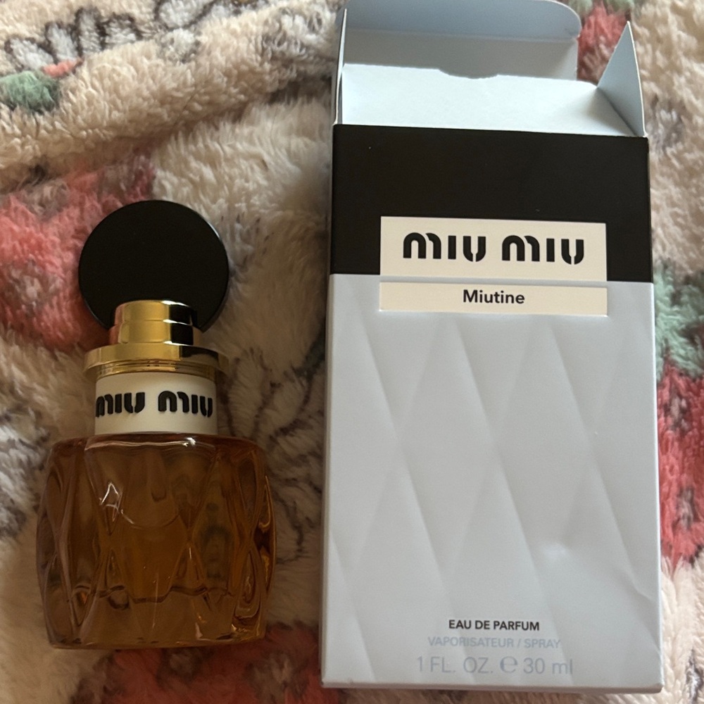 Miu Miu Miutine Eau de Parfum with Black and Gold Accents